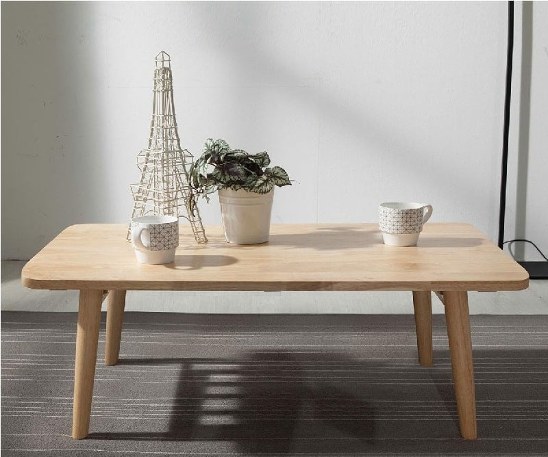 Bàn trà gỗ với kích thước phù hợp sẽ mang lại sự hài hòa cho tổng thể bộ bàn ghế